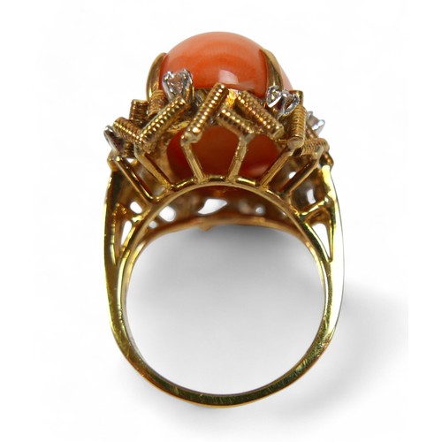 99 - A 14k gold, diamond and coral ring, circa 1960's, the pale pink oval cabochon coral approx 19 by 12m... 