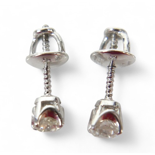 92 - A pair 18k white gold diamond solitaire earring studs, each diamond approx 0.2ct, 1.6g.