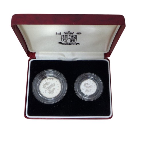 33 - A collection of Royal Mint silver proof coin sets, including a 2006 Queen Elizabeth Eightieth Silver... 