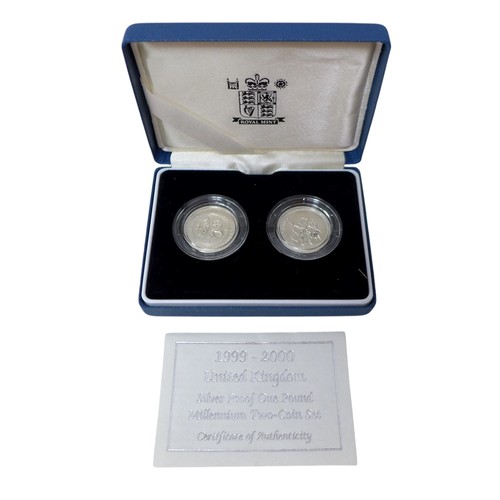 33 - A collection of Royal Mint silver proof coin sets, including a 2006 Queen Elizabeth Eightieth Silver... 