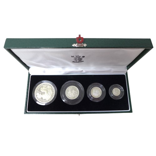 34 - A Royal Mint 1997 Silver Proof Britannia Collection, four coins with certificate of authenticity in ... 