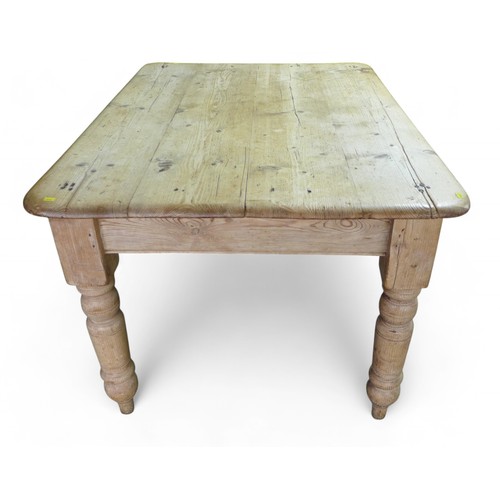 240 - A Victorian stripped pine kitchen table, with a small frieze drawer, raised on turned legs, 122 by 8... 