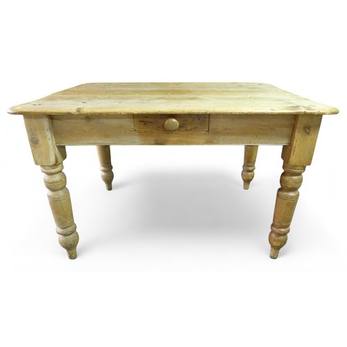 240 - A Victorian stripped pine kitchen table, with a small frieze drawer, raised on turned legs, 122 by 8... 