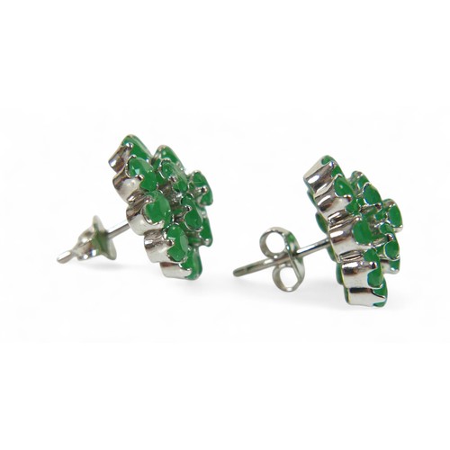 84 - A pair of emerald cluster earrings, set on 925 silver backings, total diameter 2.1cm, with box.