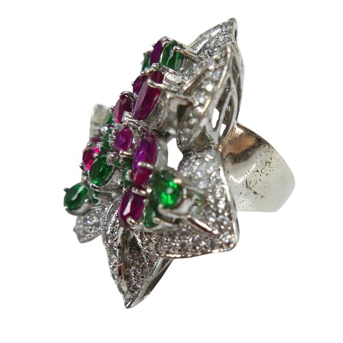 98 - A rhodium-plated silver cocktail ring, set with pink, green and white topaz in a large floral design... 