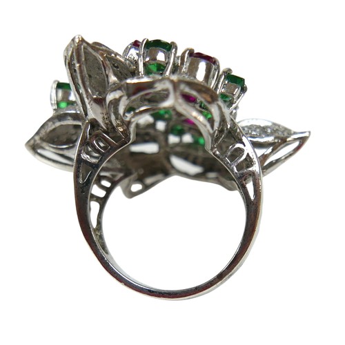 98 - A rhodium-plated silver cocktail ring, set with pink, green and white topaz in a large floral design... 