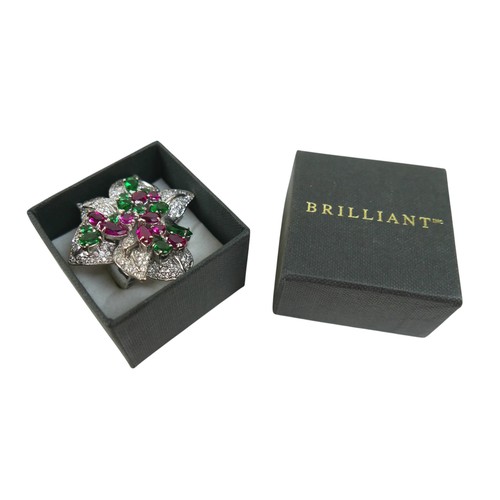 98 - A rhodium-plated silver cocktail ring, set with pink, green and white topaz in a large floral design... 