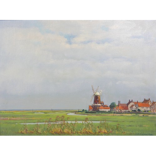 213 - F. L. Cramphorn (British, 20th century): a landscape view of Cley, Norfolk, signed lower right, oil ... 