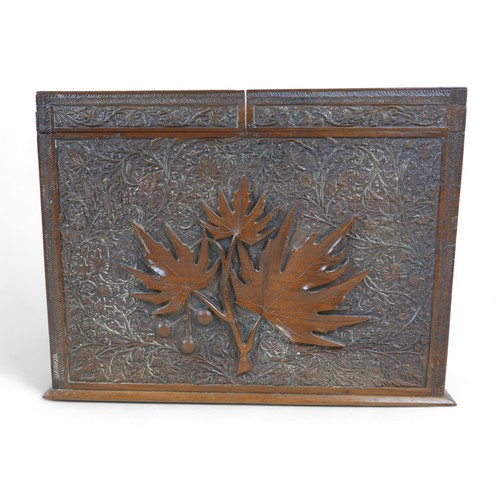 143 - An Eastern carved stationary box, with Medical Corp carving, 38 by 19 by 28cm.