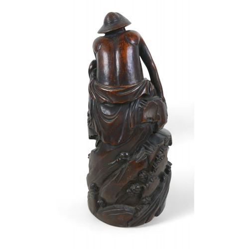 147 - A carved root wood Oriental figure, 13 by 12 by 31cm high.