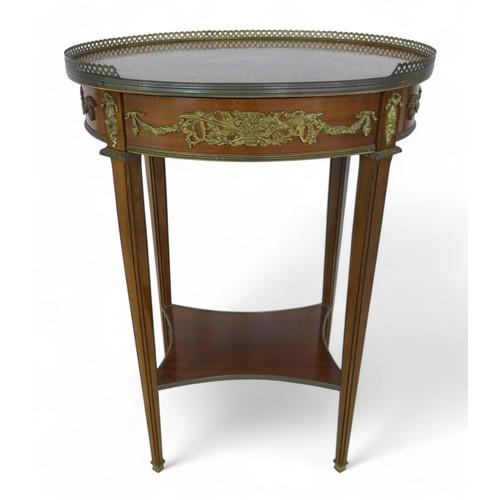 243 - A 20th century French style inlaid side table, with gallery and ormolu mounts, frieze drawer above a... 