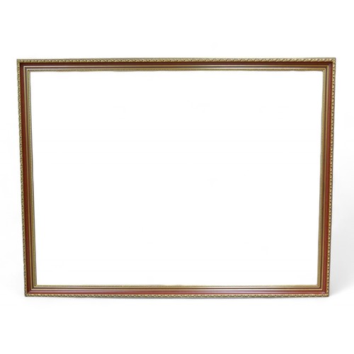 233 - A decorative wall mirror, 130 by 4 by 100cm.