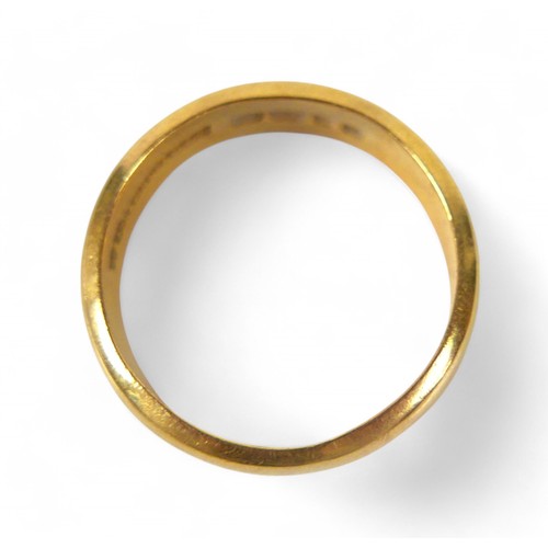 101 - A 22ct yellow gold wedding band ring, 6mm wide, size R, 10.8g.