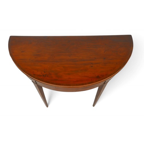 197 - A 19th century mahogany fold over demi-lune card table, 97 by 44 by 76cm high.