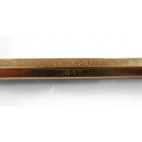 61 - A 9ct gold propelling pencil, inscribed 'James 1947', 16.1g, 8.8cm long.