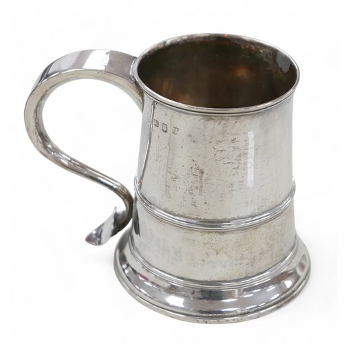 1 - A George III silver tankard, initials 'WB' engraved to the top of its scroll handle, rubbed hallmark... 