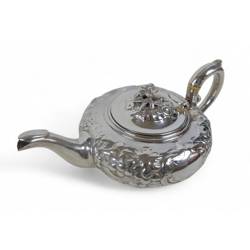 5 - A William IV silver embossed teapot, with floral decoration, and ivory insulators, Benoni Stephens, ... 