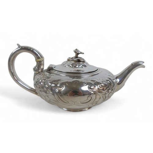 5 - A William IV silver embossed teapot, with floral decoration, and ivory insulators, Benoni Stephens, ... 