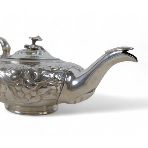 5 - A William IV silver embossed teapot, with floral decoration, and ivory insulators, Benoni Stephens, ... 