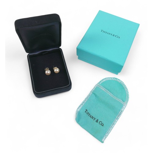 37 - A Tiffany & co sterling silver pair of pearl stud earrings, marked 925, 8mm pearls, with box.