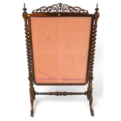 201 - An interesting Victorian rosewood needlepoint fire screen, the design is of a Landseer painting of Q... 