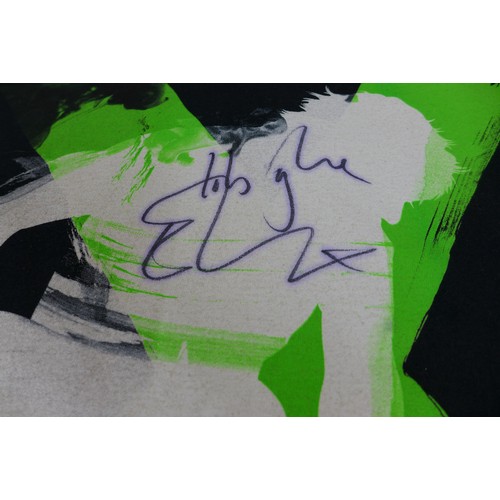 128 - Ed Sheeran a signed T-shirt Wembley July 2015 and a signed program with ticket. (3)