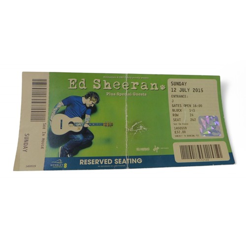 128 - Ed Sheeran a signed T-shirt Wembley July 2015 and a signed program with ticket. (3)