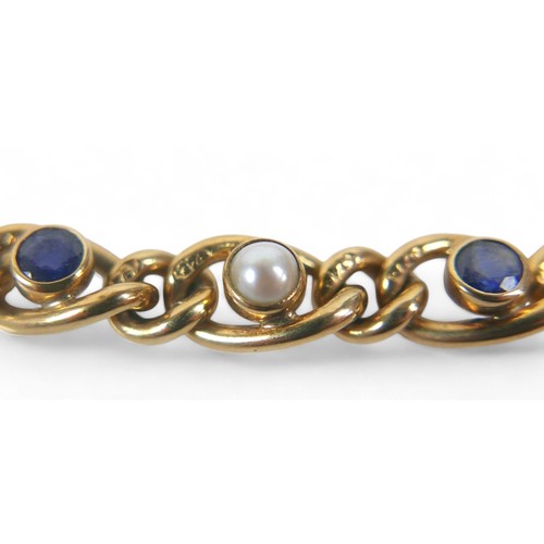 74 - A 9ct yellow gold sapphire and pearl chain link bracelet, 19cm long by 6.6mm, 16.5g.