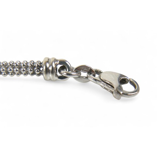 33 - A 9ct white gold bracelet, 19cm long by 5.5mm wide, 6.0g.