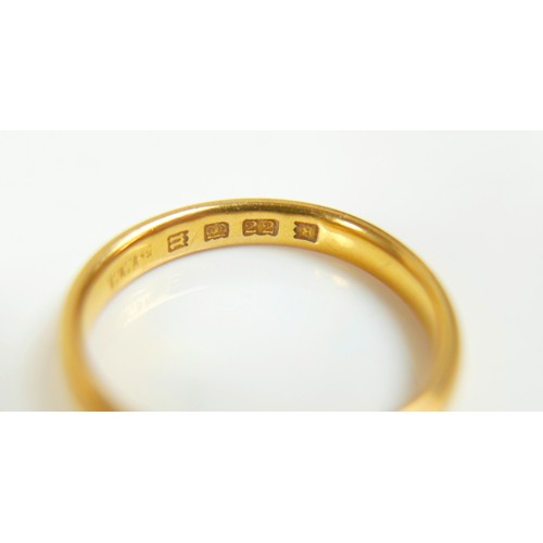 73 - Two 22ct yellow gold band rings, sizes M, O, 2.7 and 2.9mm depth, total weight 6.1g.(2)