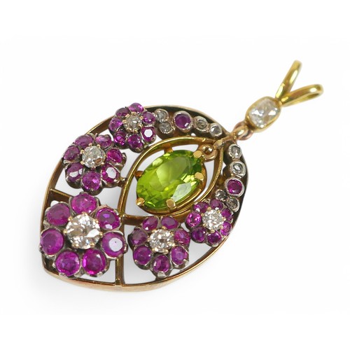 85 - An impressive early 1900s Belle Epoque Suffragette pendant set with diamonds, rubies around a centra... 