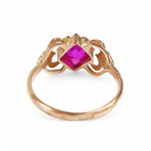 31 - A 14ct yellow gold ruby/pink sapphire ring, size O, stone size 6.5 by 6.5 by 4.5mm, weight 2.9g.