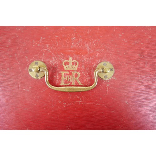 151 - An Elizabeth II red Morocco leather British government dispatch box with gilt embossed ERII cipher t... 