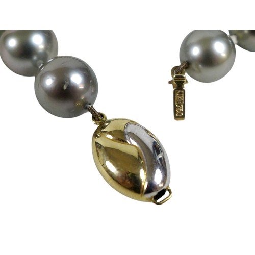 106 - A Tahitian black cultured pearl necklace, with thirty nine beads graduating in size from 10.0mm to 1... 