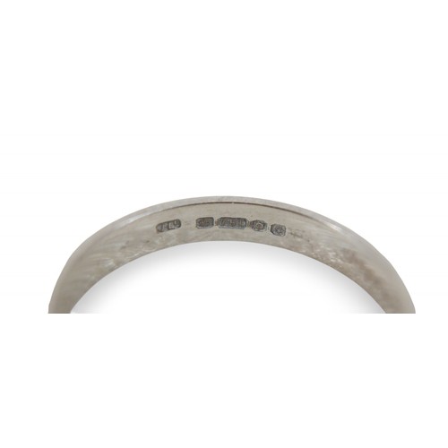 38 - An 18ct white gold band, size O, 2.38g.