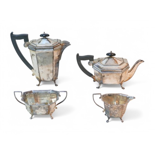 3 - A George V silver four piece tea service, comprising teapot, 27 by 12 by 13cm high, coffee pot, 23.5... 