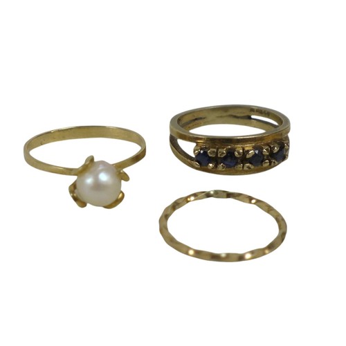 68 - Three yellow gold rings, an 18ct pearl ring size O 1.6g, and two 9ct gold rings size K, total weight... 