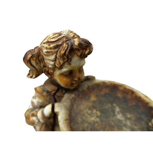 164 - A cast iron figure of a girl by a birdbath, 19 by 11 by 29cm high.