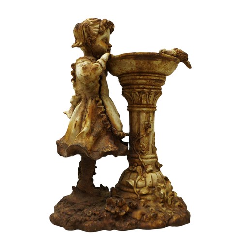 164 - A cast iron figure of a girl by a birdbath, 19 by 11 by 29cm high.