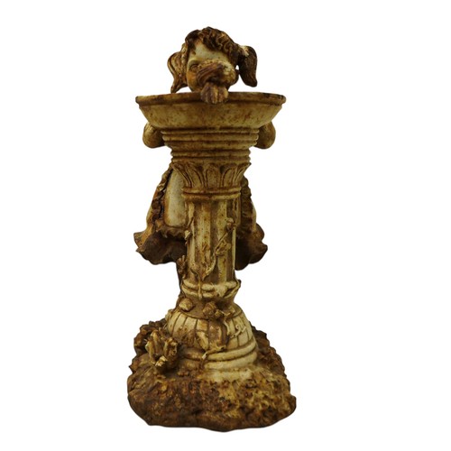 164 - A cast iron figure of a girl by a birdbath, 19 by 11 by 29cm high.