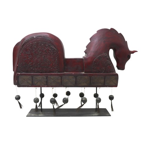 222 - A carved wooden horse figure, on a metal stand 64 by 12 by 47cm high.