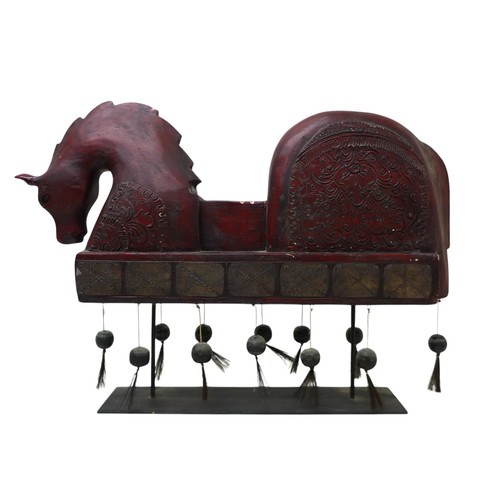 222 - A carved wooden horse figure, on a metal stand 64 by 12 by 47cm high.