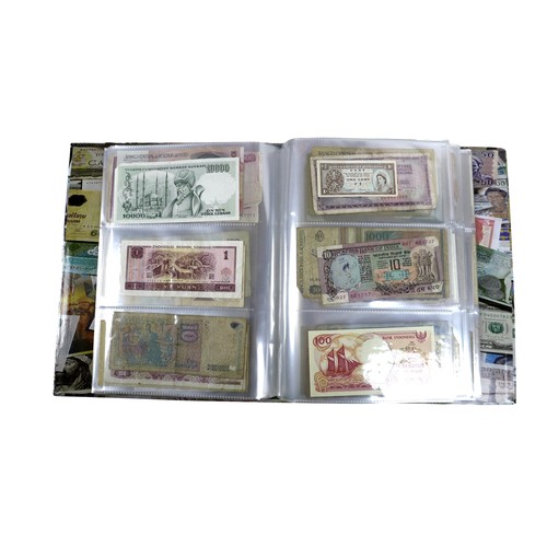 117 - Three large folders of world banknotes.(3 )