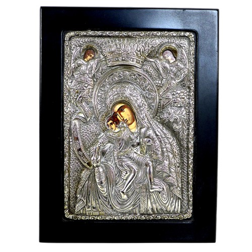 13 - Two contemporary silver fronted icons, largest 16 by 2 by 19cm.(2)