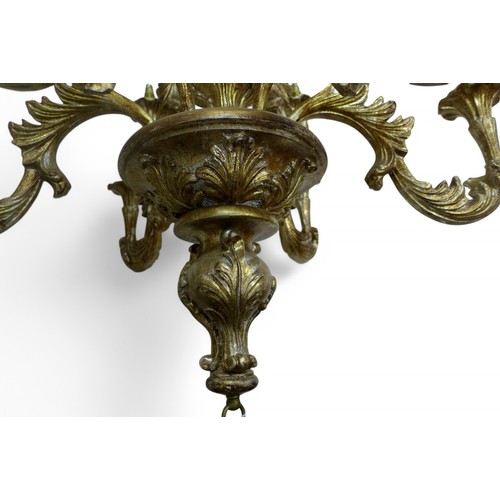 238 - A Rococo style ten branch gilt chandelier, with acanthus scroll decoration, 80 by 80 by 110cm high.