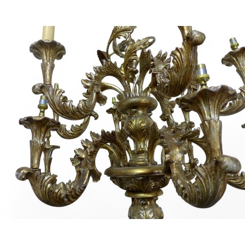 238 - A Rococo style ten branch gilt chandelier, with acanthus scroll decoration, 80 by 80 by 110cm high.