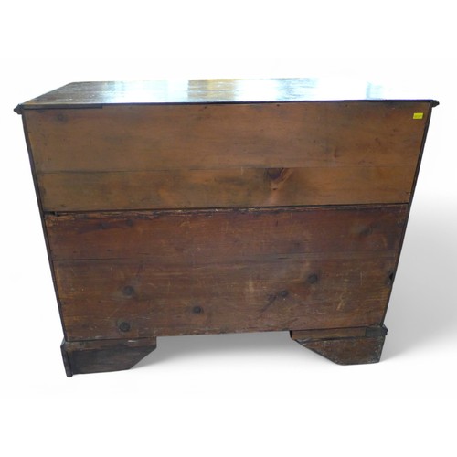 310 - A George III oak four drawer chest on shaped bracket feet, 89 by 49 by 74cm high.