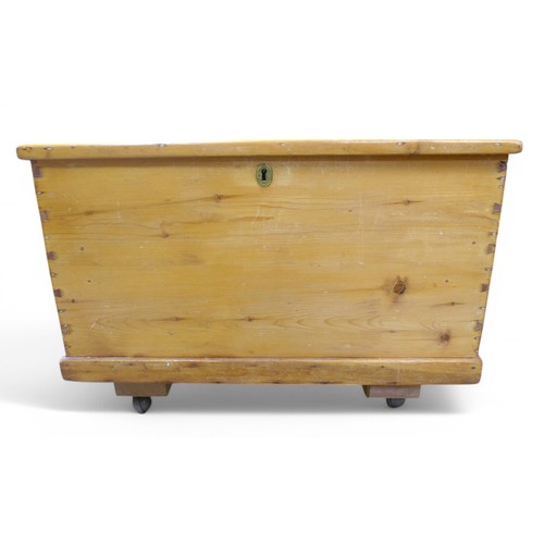 279 - A Victorian stripped pine blanket box, on later casters, 81 by 46 by 57cm high.