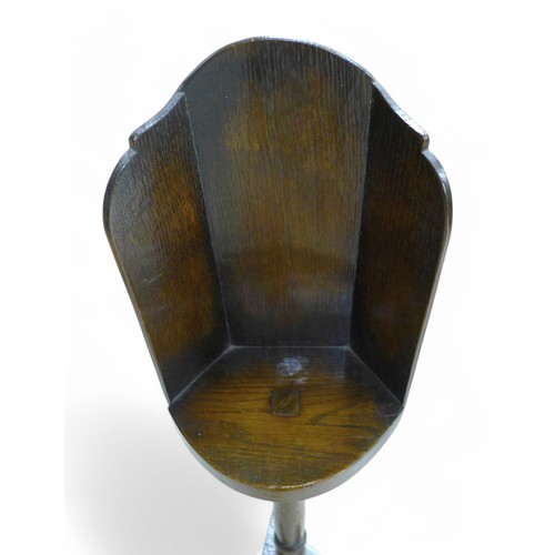 281 - An antique oak candle stand, 28 by 29 by 103cm high.