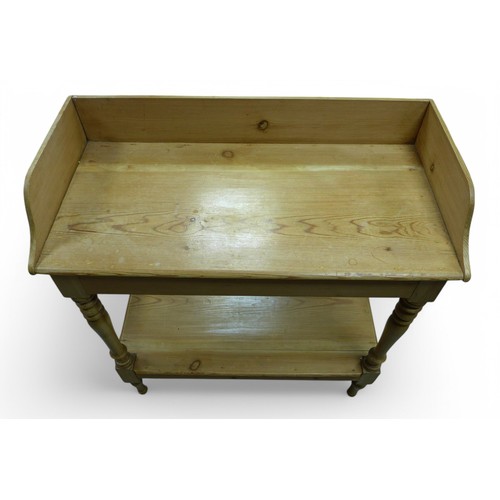 278 - A 19th century stripped pine washstand, 81 by 41 by 83cm high.